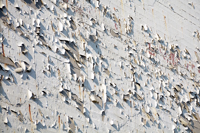 House Wall With Flaking Paint