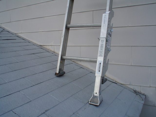ladder feet on roof